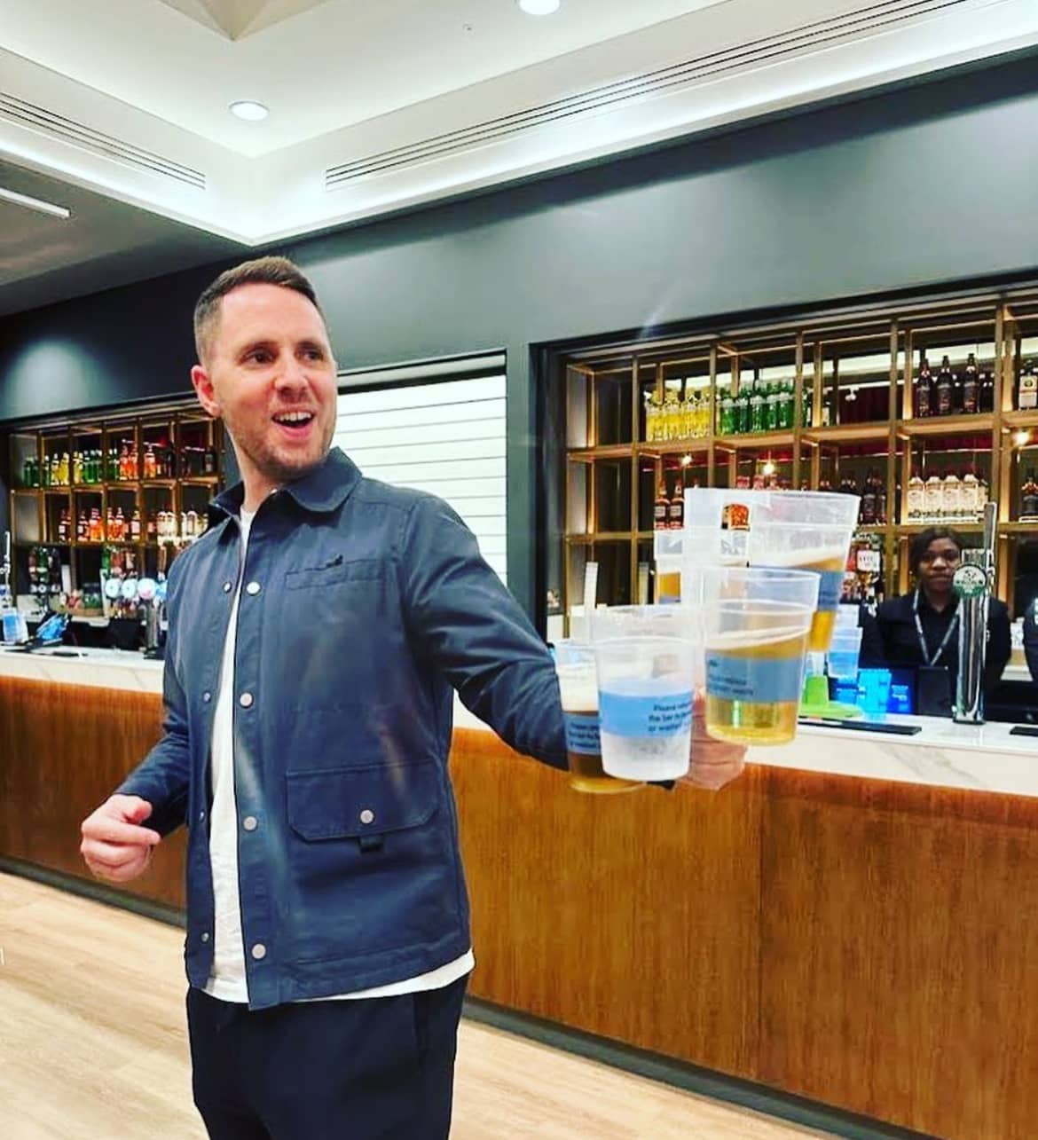 Conference attendees with cups